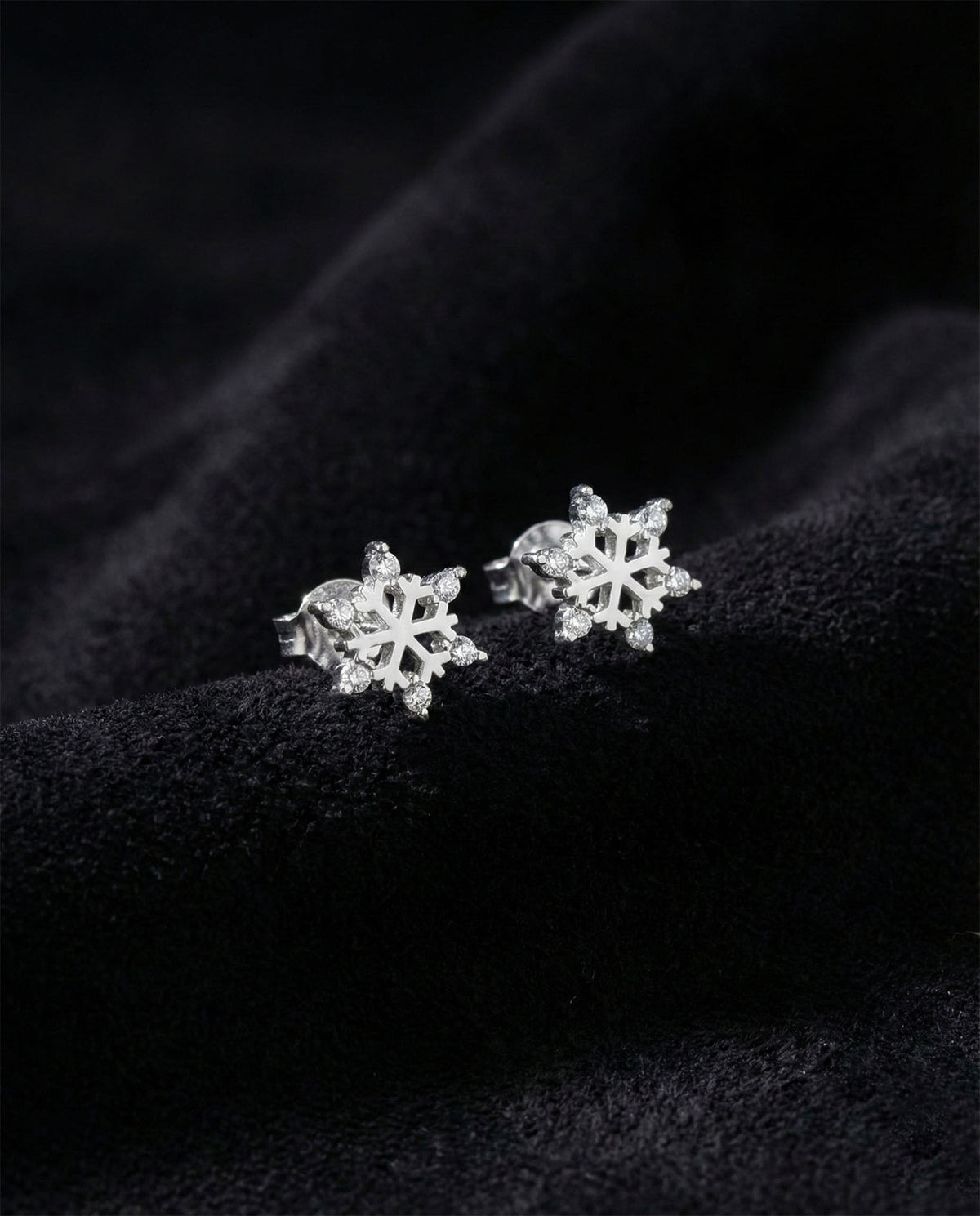 Rhodium Plated Snowflake Zircon Stud Earrings in 925 sterling silver