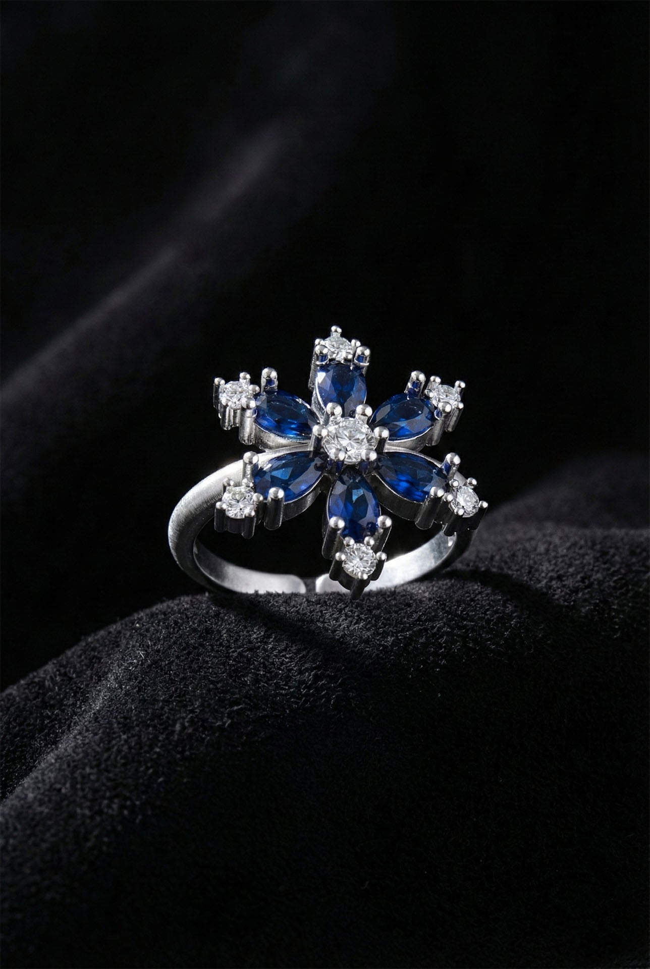 925 Sterling Silver Rhodium Plated Lotus Flower Adjustable Ring with Sapphire Stone