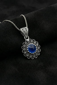 December Blue Topaz Birthstone Filigree Silver Necklace with Flower Motif