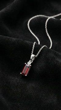 Rhodium Plated Ruby Solitaire Baguette Silver Necklace