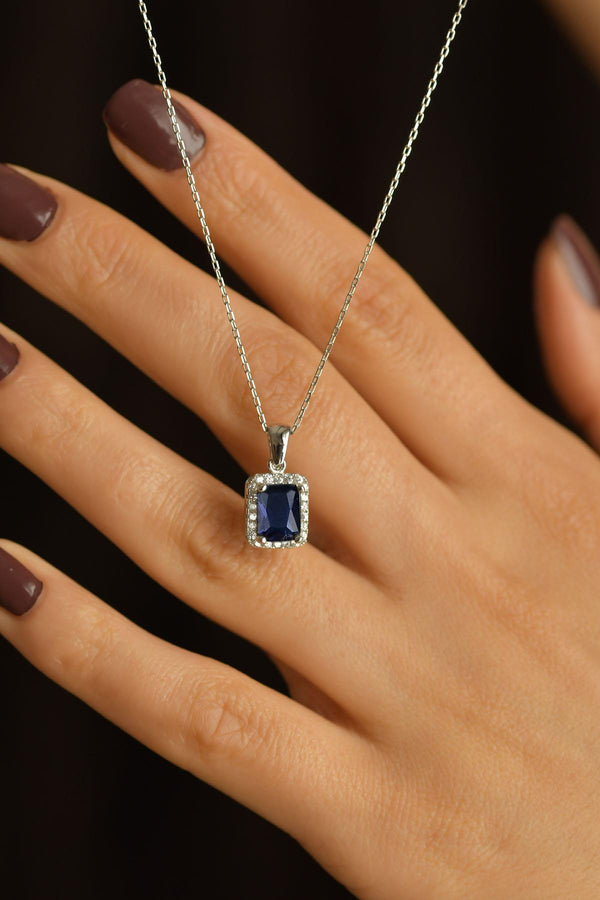 Rhodium Solitaire Baguette Silver Necklace with Sapphire Stone