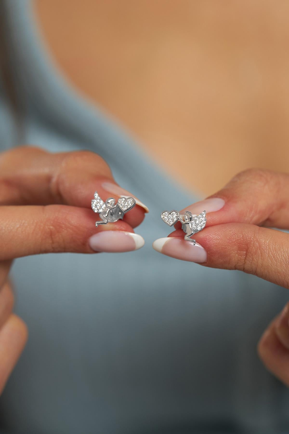 CZ Eros Love Angel Stud Earrings Rhodium Plated Silver