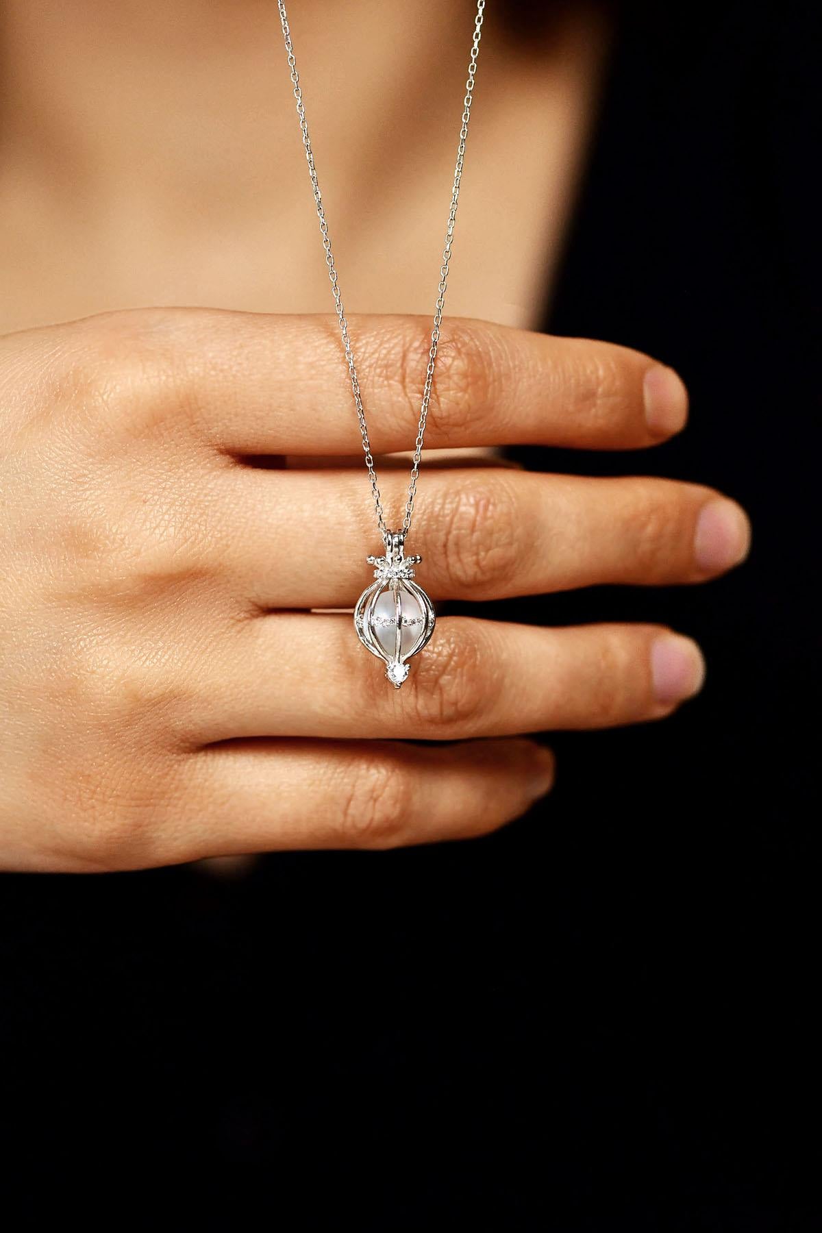 Rhodium-Plated Cage Silver Necklace with Zircon Stones and Pearl