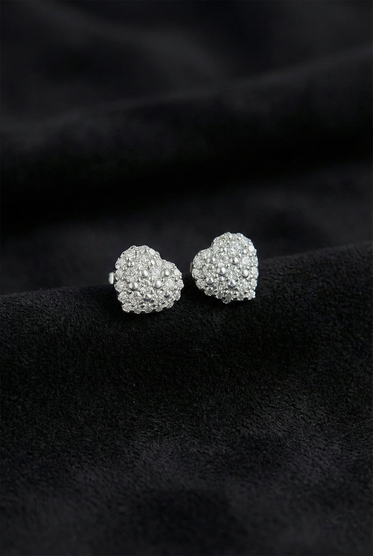 Rhodium Zircon Heart Stud Earrings in 925 sterling silver