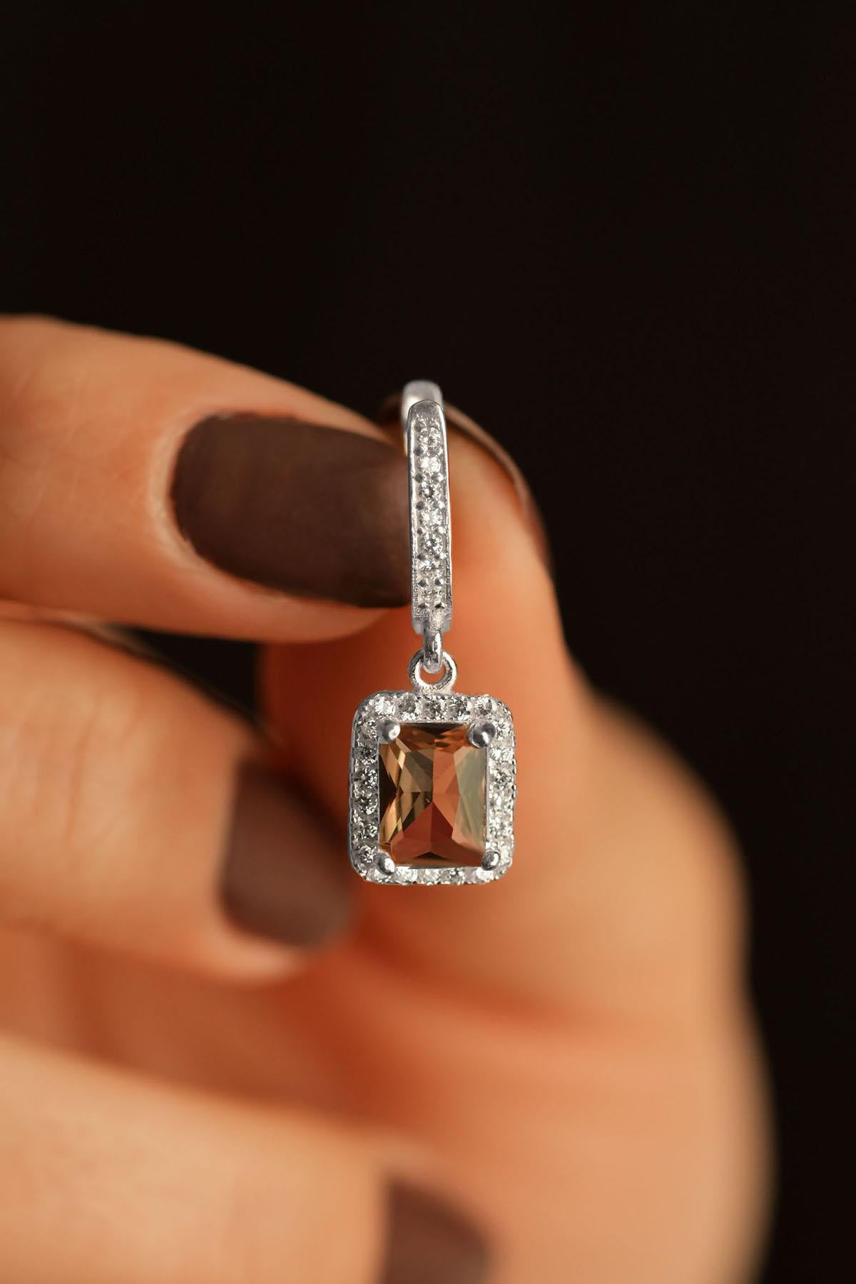 Rhodium-Plated Solitaire Drop Baguette Silver Earrings with Zultanite Stone